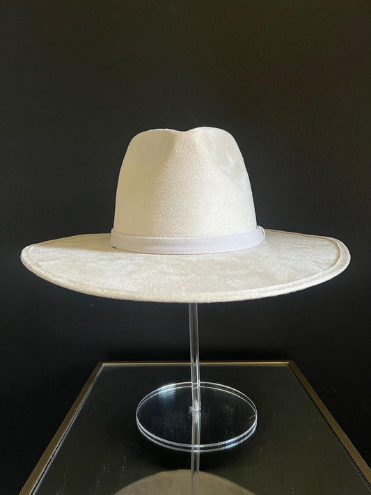 This Off-White hat has a big brim that sits flat on the forehead